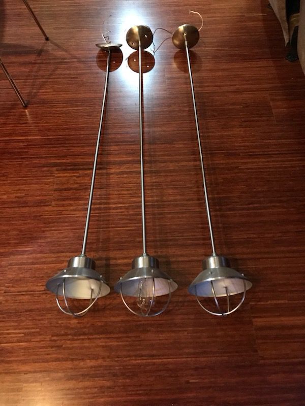 Three hanging light fixtures