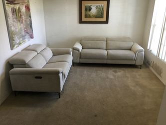 Dual Power Reclining Couch and Loveseat