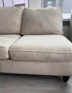 Haverty’s Cream loveseat