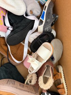 Box of winter baby shoes