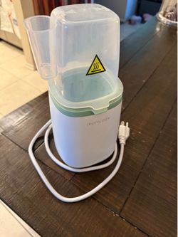 Mom cozy bottle warmer