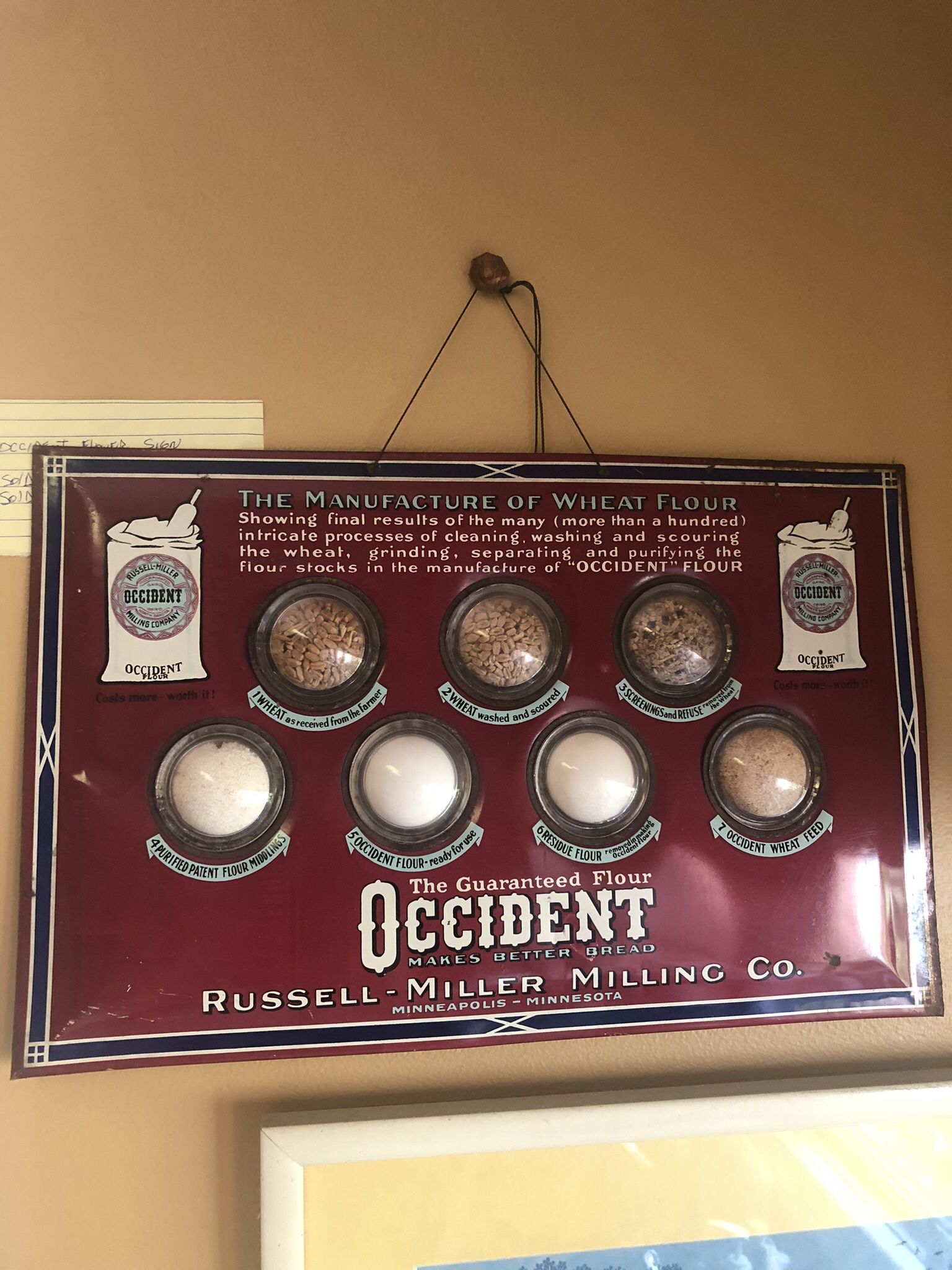 Occident Flour. There is seven glass bubble containers