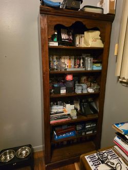 2 bookshelves full of movies DVD  VHS