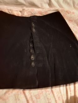2 Blk Skirts One Pair Of Shorts