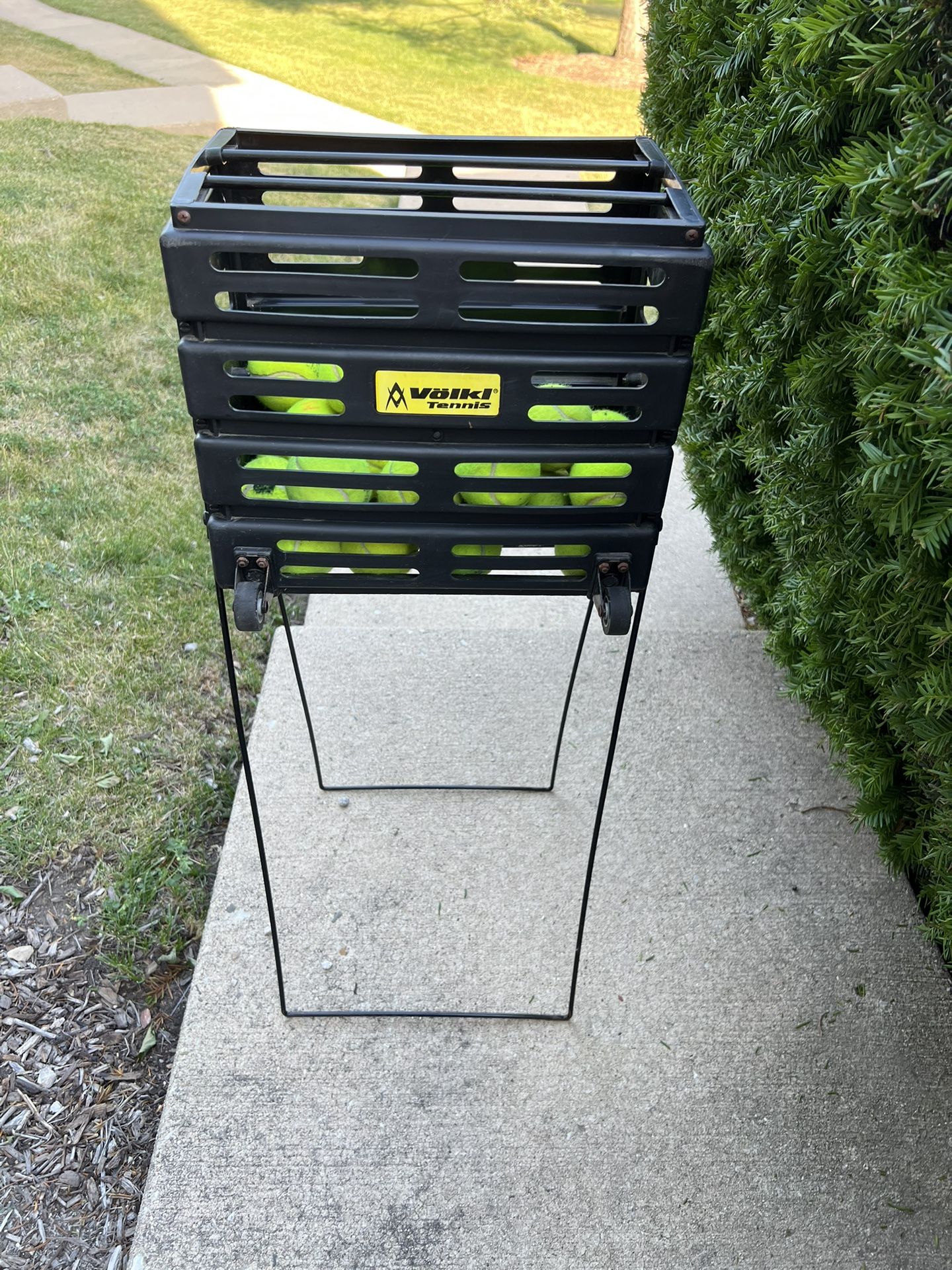 Tennis ball hopper with wheels