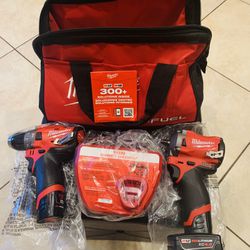Milwaukee M12 Hammer Drill And Stubby 3/8 Impact Wrench  New $330 Firm