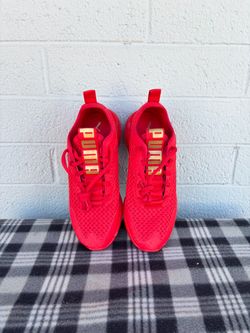 Puma Red Sneakers with Gold Branding