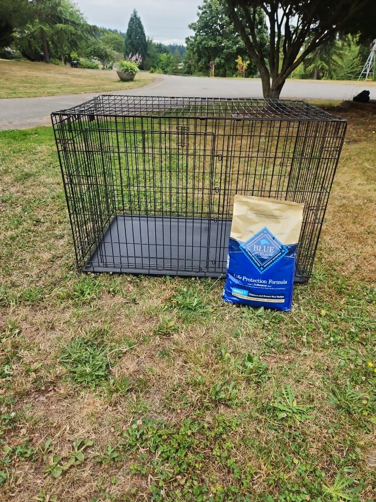48 " Folding Dog Crate With Sealed Bag Of Blue Buffalo Dog Food