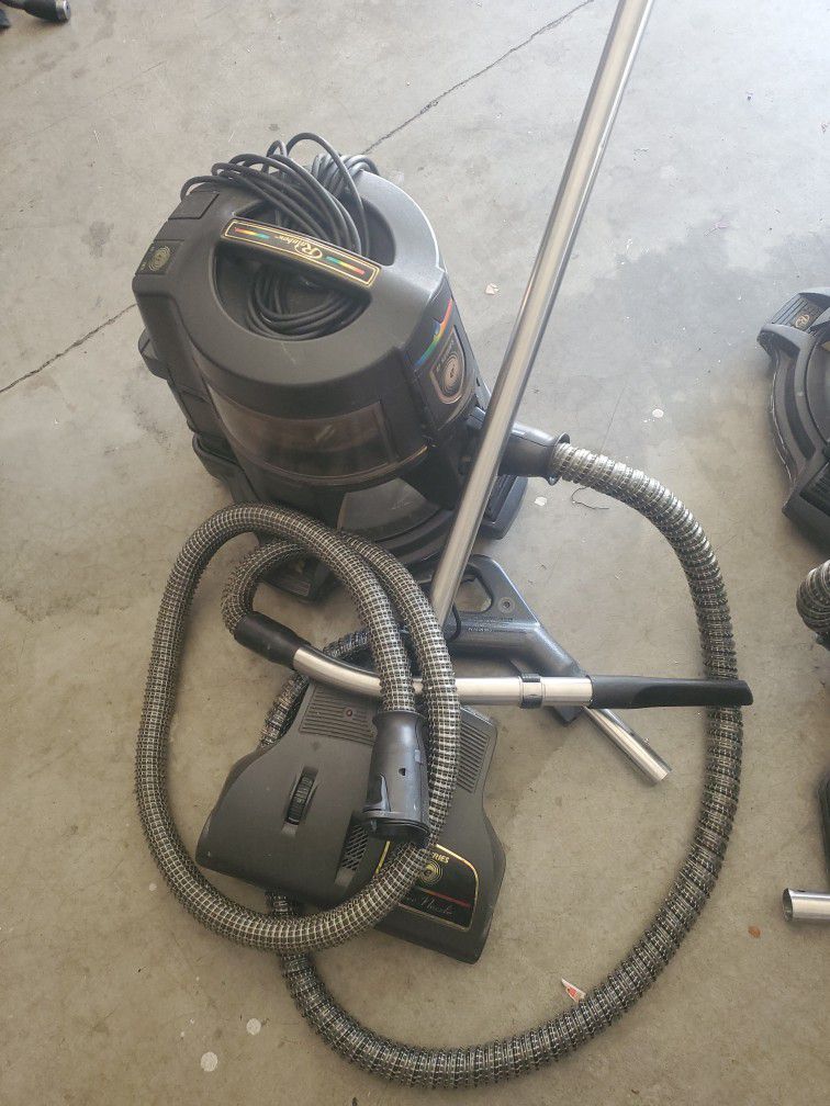 2 Rainbow E Series Vacuums