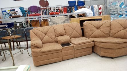 Beige sectional. With two recliners inside