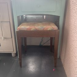 Old Fashioned Sewing Machine And Stool.