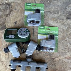 “New Orbit hose timer watering kit with multiple valves and 4-way splitter