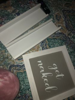 Restroom shelves & sign