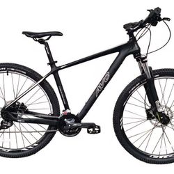 This is an AVC Ultra Leggera mountain bike featuring a lightweight carbon fiber frame. 
