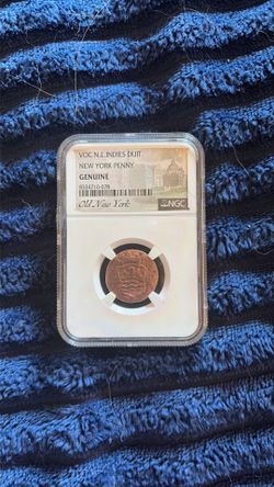 Old penny coin graded