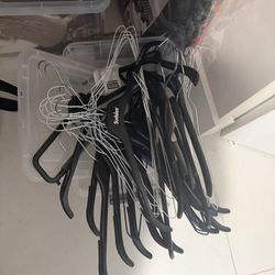 Black and Silver Plastic and Metal Clothes Hangers