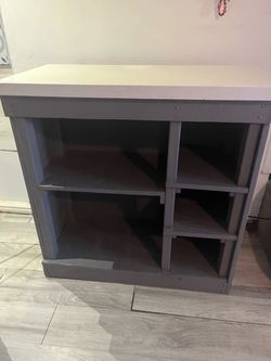 Island, bookshelf, storage, white quartz countertops