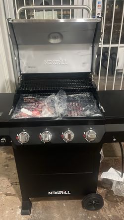 Nexgrill 4-Burner Gas Grill ( new lightly scratched)