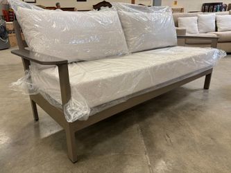 Pavillion Outdoor Loveseat with Beige Cushions and Metal Base
