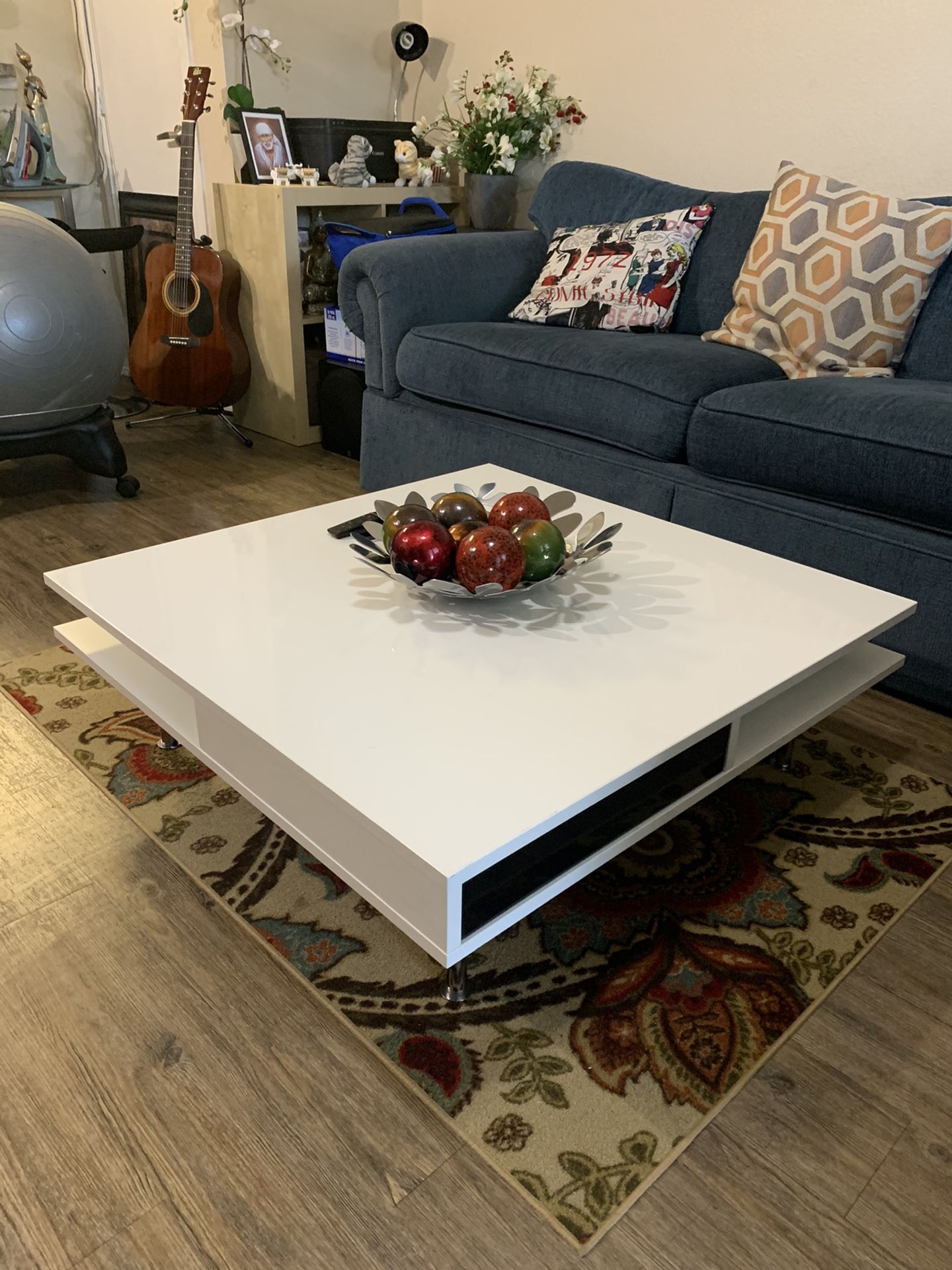 White glossy coffee table with chrome finished legs