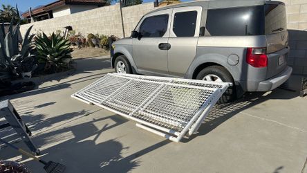 Mobile PVC fence, used; 4 pcs. $40.00; pick up only.