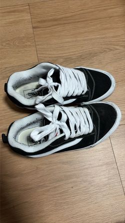 Vans Black and White High-Top Sneakers