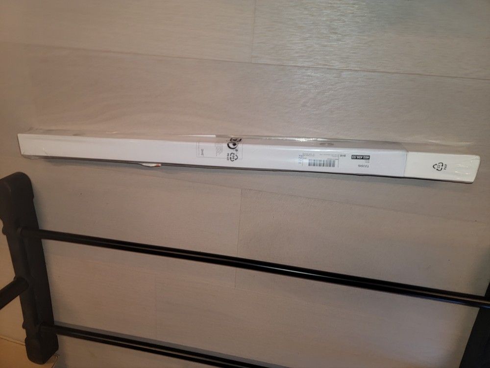 Ikea TJUSIGWall/door rack with knobs, black, 23 ½ "