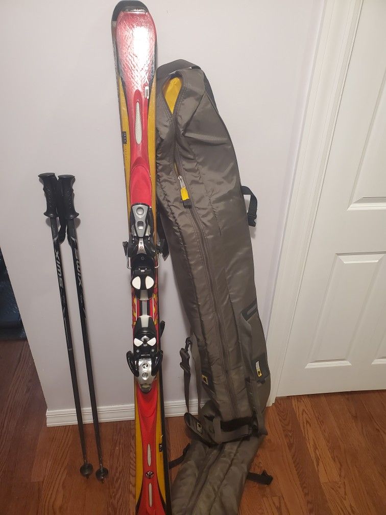 ski set with pole in bag
