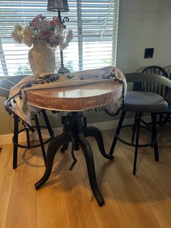 HIGH END  Bistro table and (2) chairs