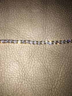 Gold tennis bracelet