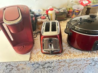 Red coffee maker, toaster and crock pot