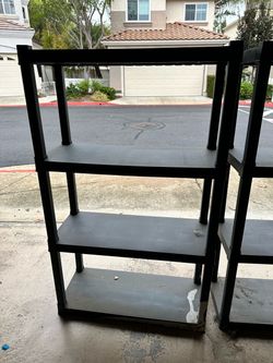 Two - Black Plastic 4-Tier Storage Shelving Units