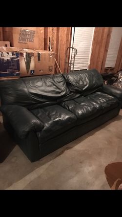 Very nice leather sofa loveseat ottoman excellent condition like new