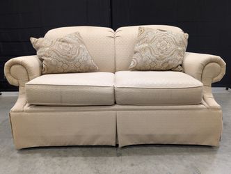 Classic Tan Two-Seater Sofa with Rolled Arms