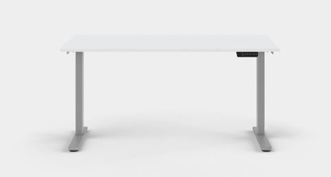 Brand-new Humanscale eFloat Go 2.0 electric sit/stand desk in silver and white