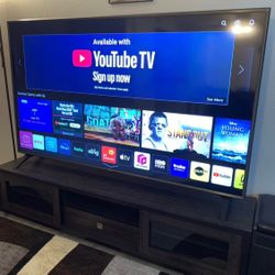 75 inch LG Smart TV and Credenza
