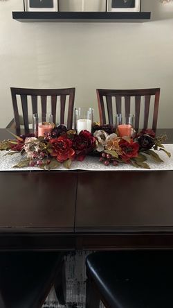 3-tier candle centerpiece. Candles and floral decor included. 34” total