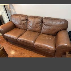 Brown sofa and loveseat set