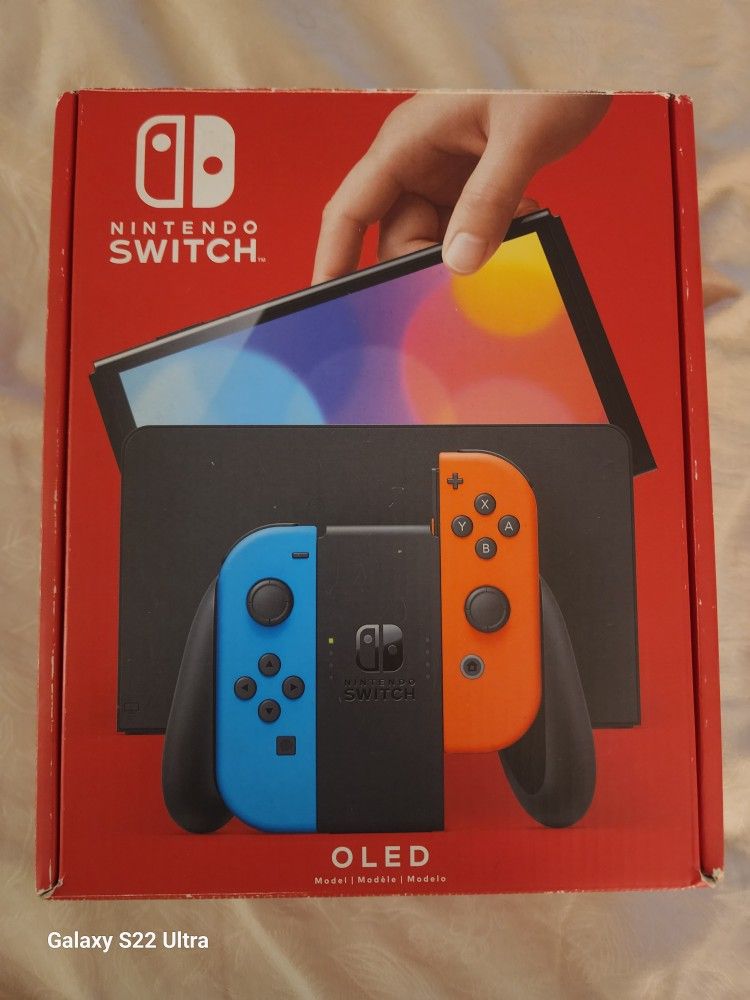 NIB NEVER USED NINTENDO SWITCH OLED