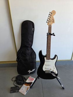 Fender electric guitar and accessories