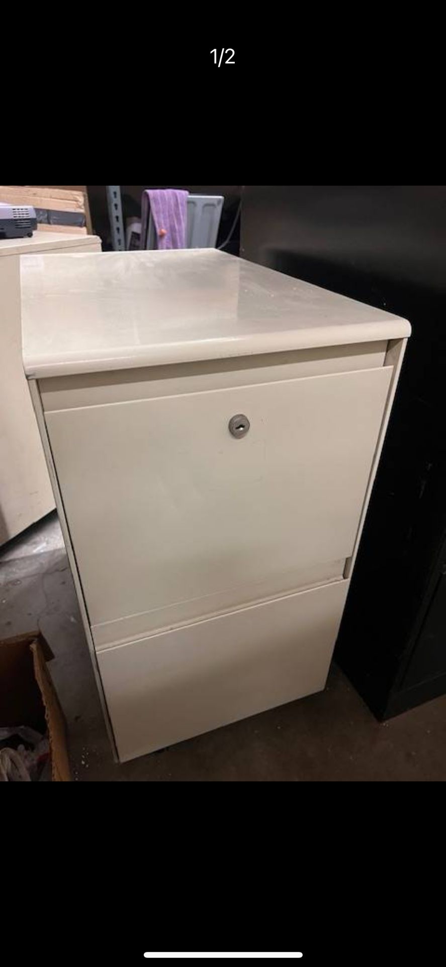 2 Drawer Filing cabinet. Letter size. Neutral Light Color. On wheels