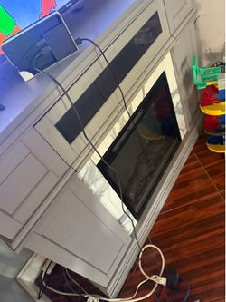 Tv stand with fire place heated