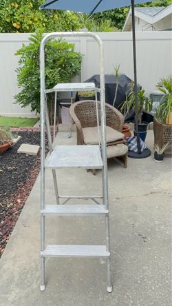 Painters ladder with paint shelve and brush holder