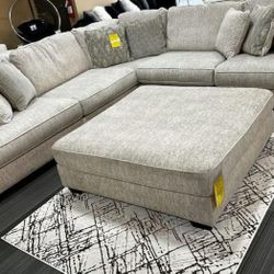 Rawcliffe Parchment 3 Piece Sectional With Ottoman 