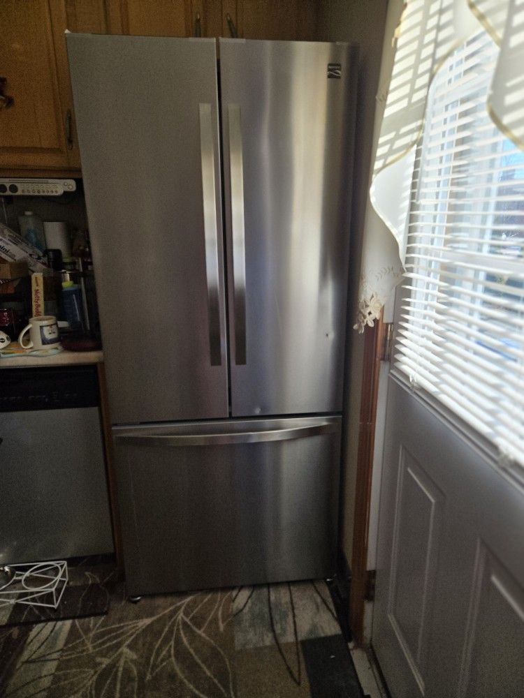Kenmore French door 30 inch wide Refrigerator, for parts or repair.