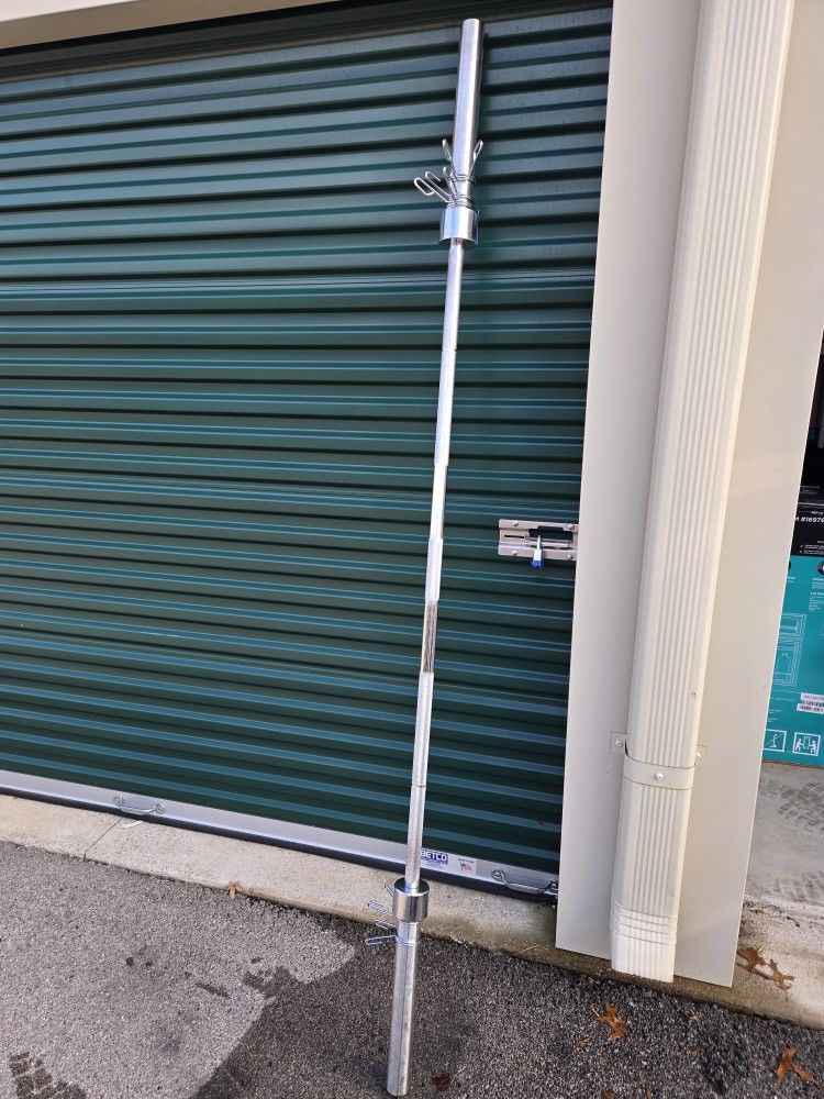 Like New 2" Olympic Barbell."CHECK OUT MY PAGE FOR MORE DEALS "
