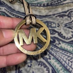 MK Tag Charm $3 FIRM (shows Wear) AS IS