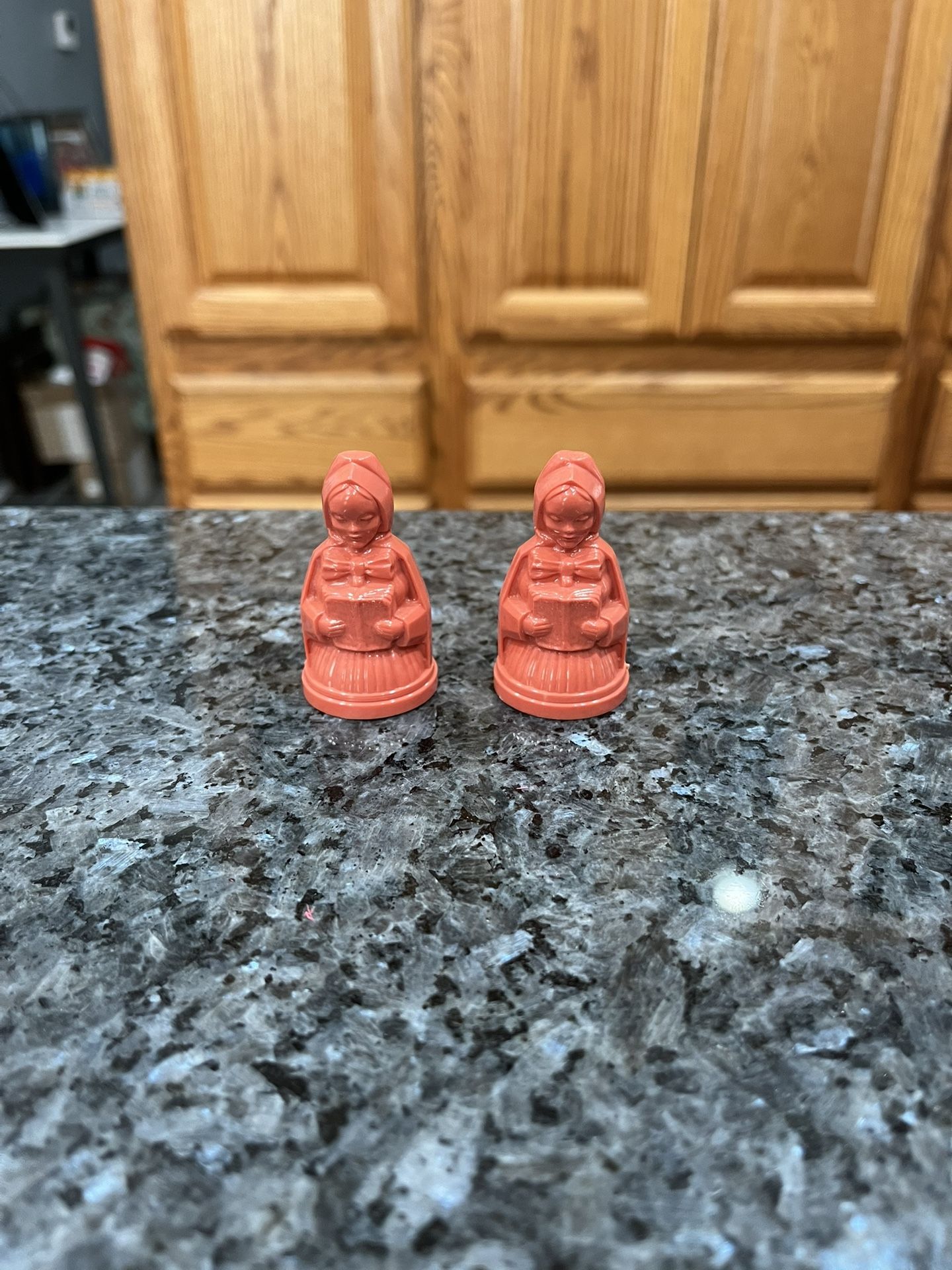 Vintage Victoria Mini Plastic Christmas Carolers pair of Salt and Pepper Shakers. Size approximately 2 inches tall. Preowned.