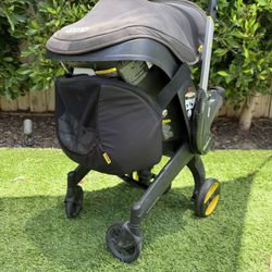 Doona Infant Car Seat & Stroller with Base – All-in-One Travel System
