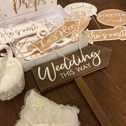 Wedding sign, ring, pillow and basket and champagne flutes